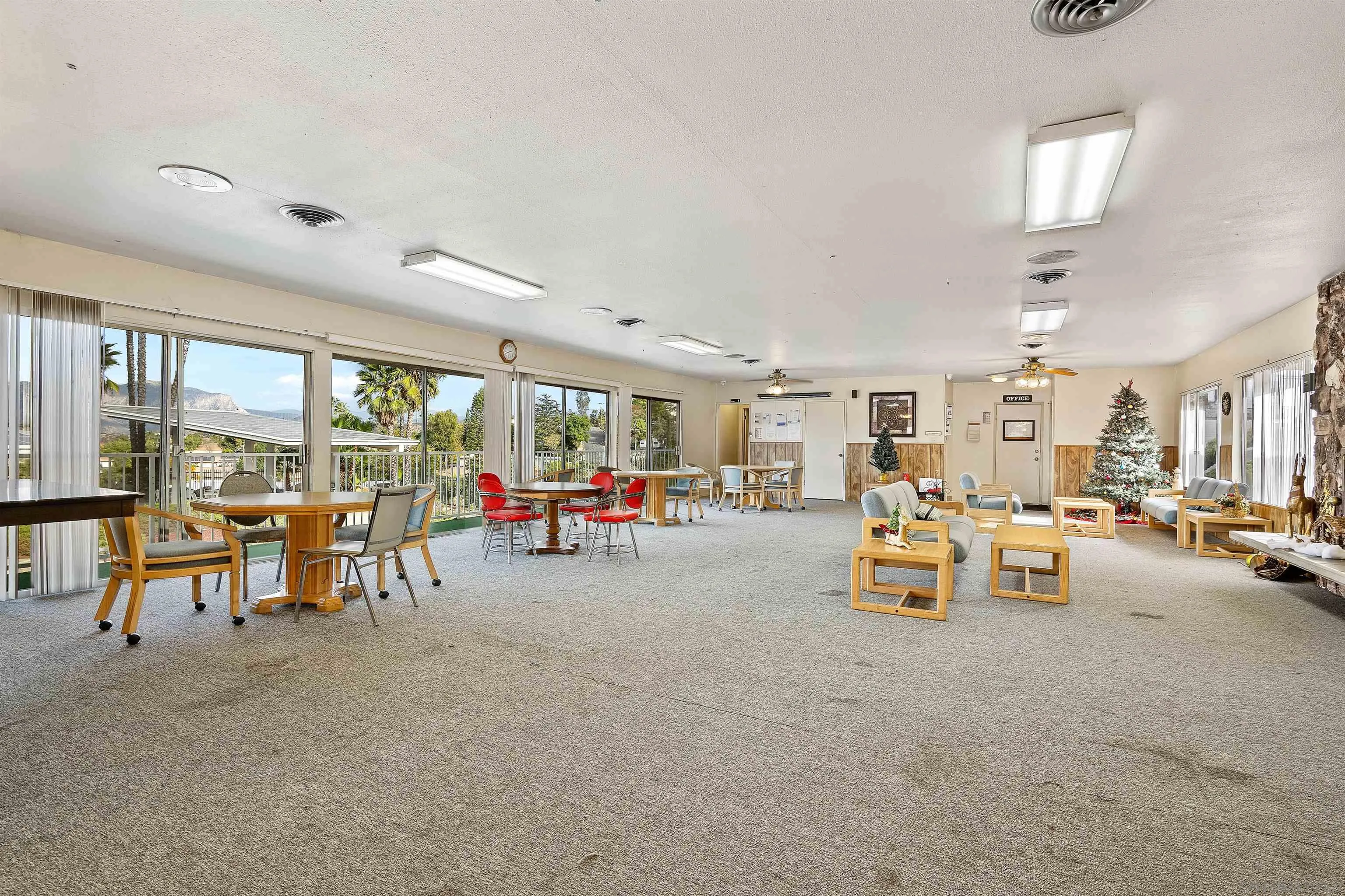 9100 Single Oak Drive, Unit 24 Lakeside, CA 92040 - Photo 47 of 48 a view of a livingroom with furniture and a garage
