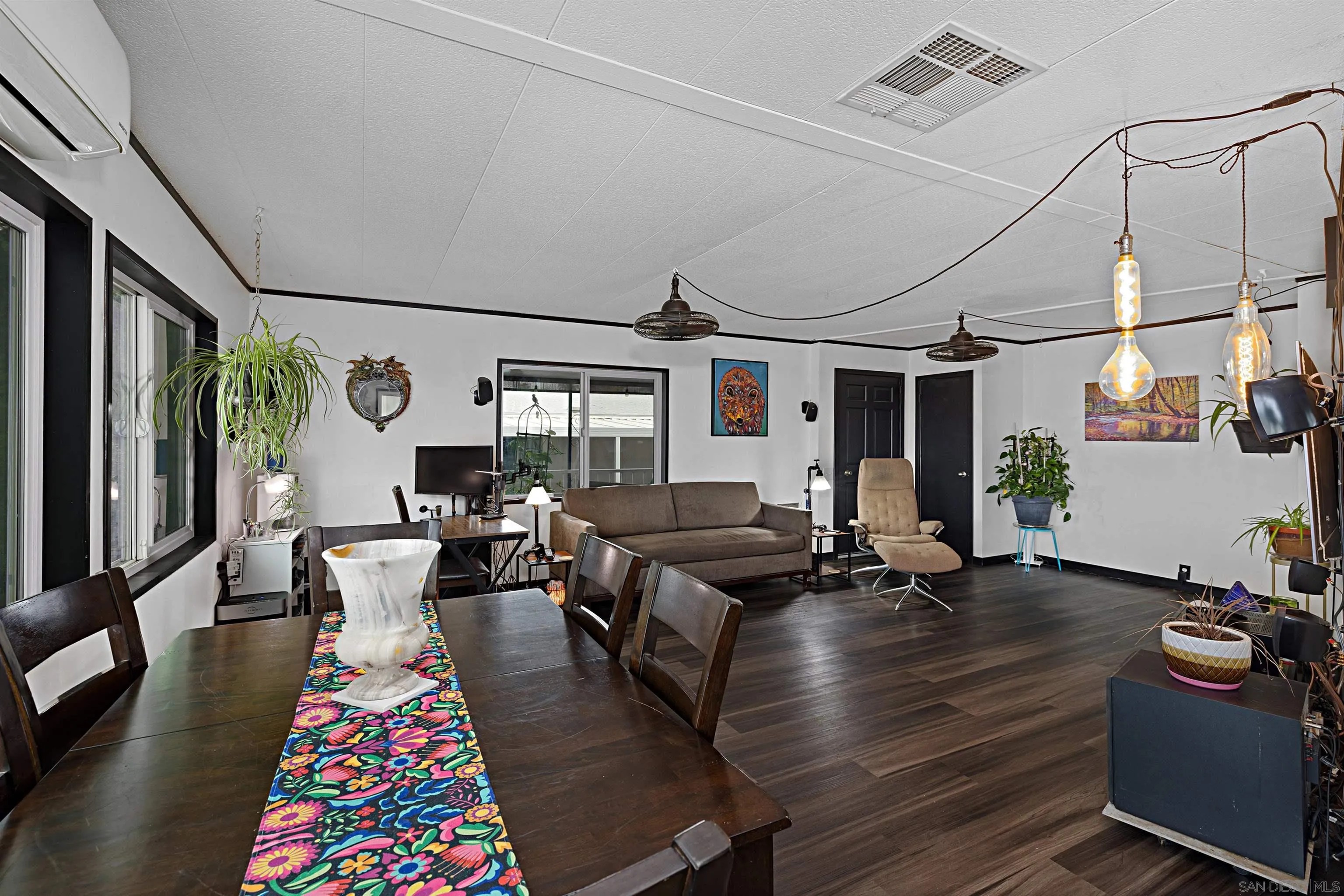 9100 Single Oak Drive, Unit 24 Lakeside, CA 92040 - Photo 9 of 48 a living room with furniture and wooden floor