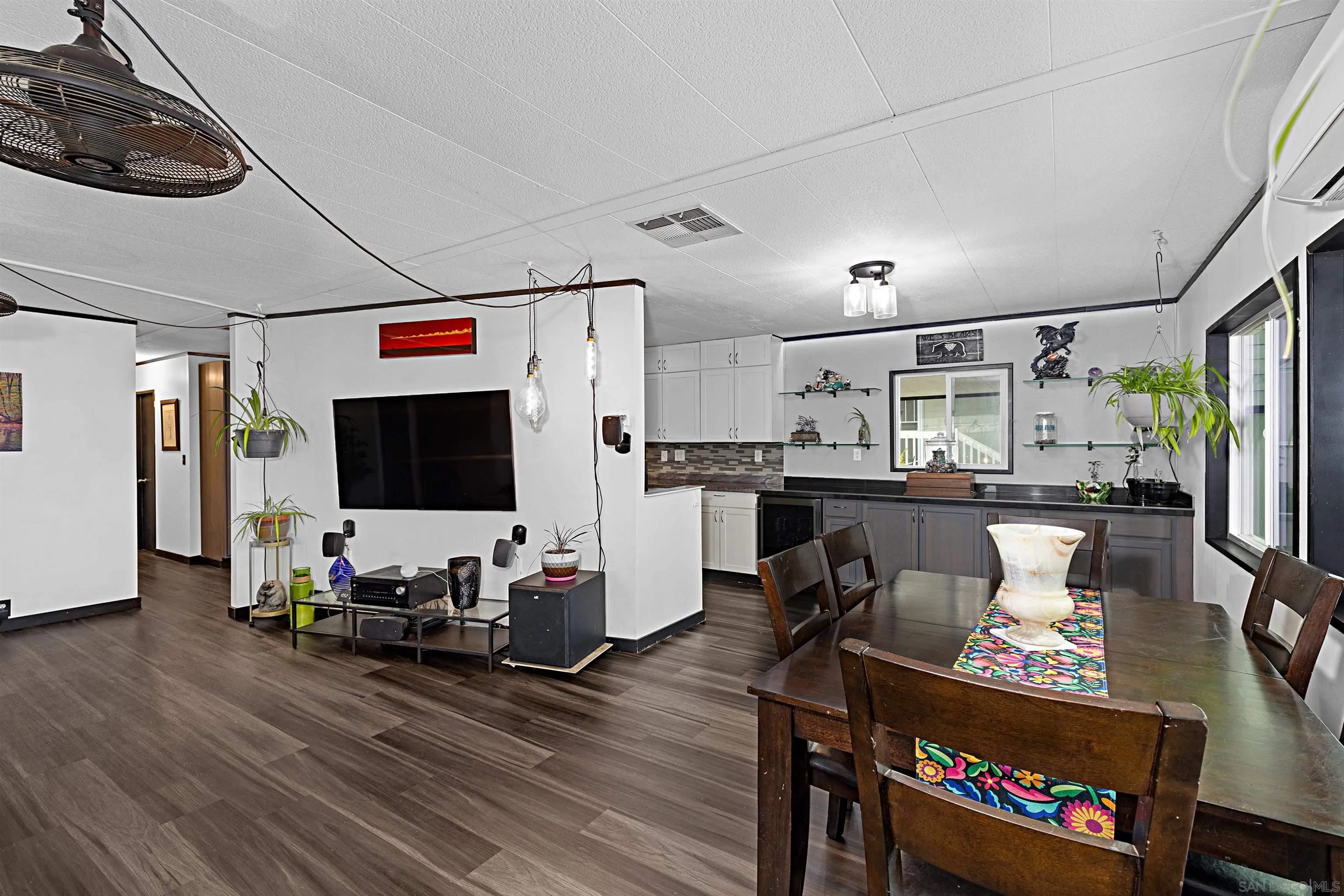 9100 Single Oak Drive, Unit 24 Lakeside, CA 92040 - Photo 10 of 48 a living room with furniture and a flat screen tv