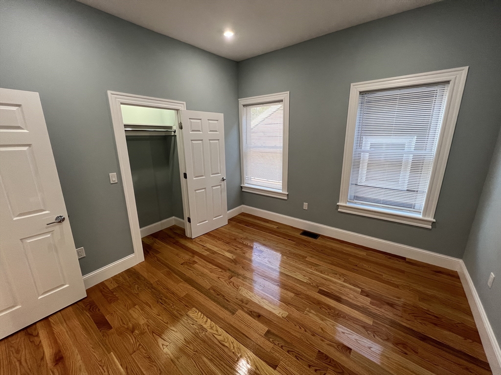 29 Alpine Street, Unit 1 Somerville, MA 02144 - Photo 19 of 33 wooden floor and window in a room