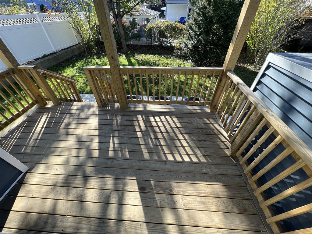 29 Alpine Street, Unit 1 Somerville, MA 02144 - Photo 32 of 33 a view of balcony with wooden floor and outdoor seating