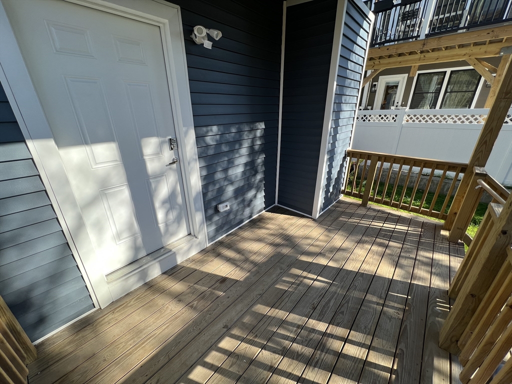 29 Alpine Street, Unit 1 Somerville, MA 02144 - Photo 33 of 33 a view of balcony with wooden floor