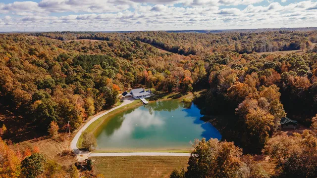 a house with river in front of it