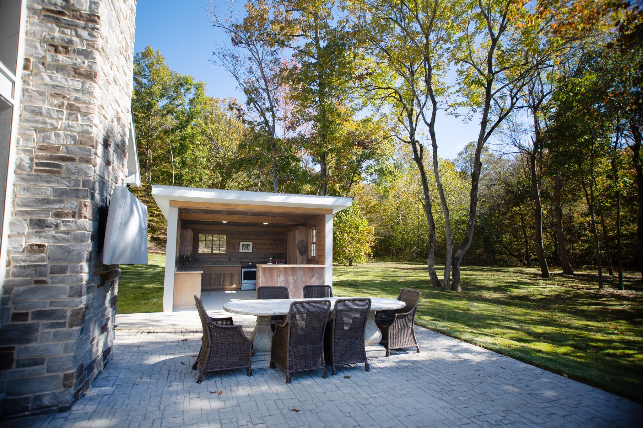 0 Scepter Road Waverly, TN 37185 - Photo 19 of 53 a view of a patio with table and chairs potted plants and large tree