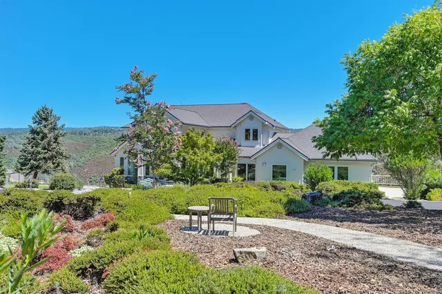 a kitchen with a sink stove and microwave