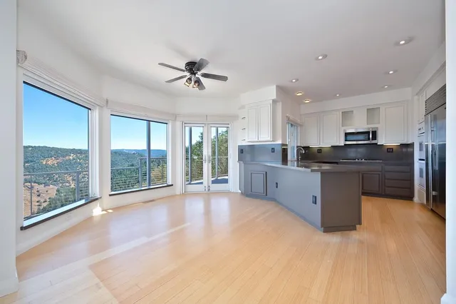 a kitchen with a stove and a sink