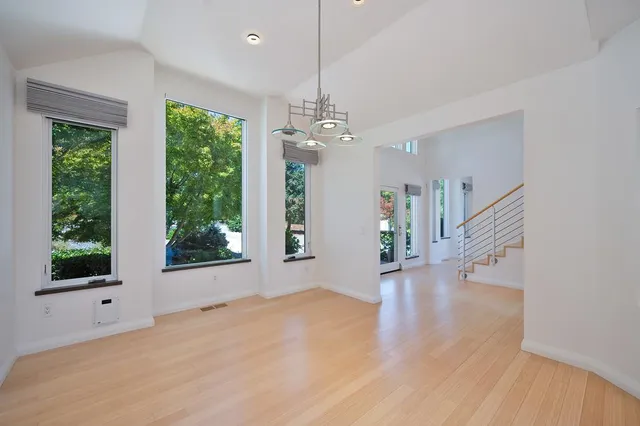 a view of swimming pool with seating space