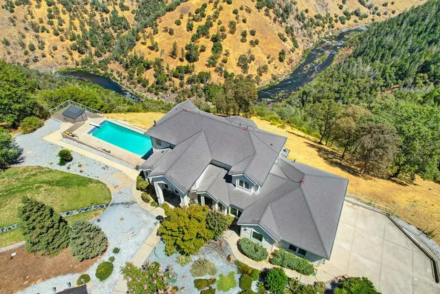 a view of a dining room with furniture and window