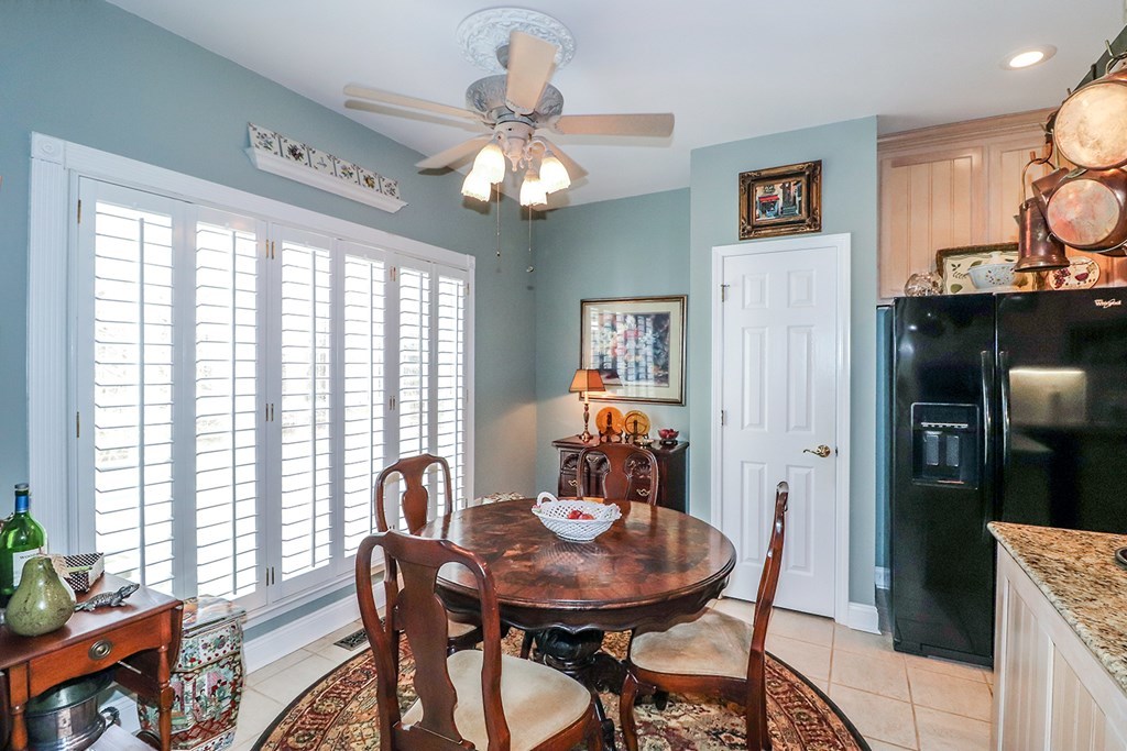 2700 Maynards Mill Road Forsyth, GA 31029 - Photo 14 of 44 a view of a dining room with furniture window and wooden floor
