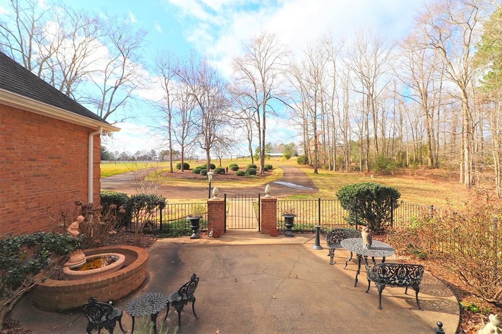 2700 Maynards Mill Road Forsyth, GA 31029 - Photo 40 of 44 a view of a lake with outdoor seating