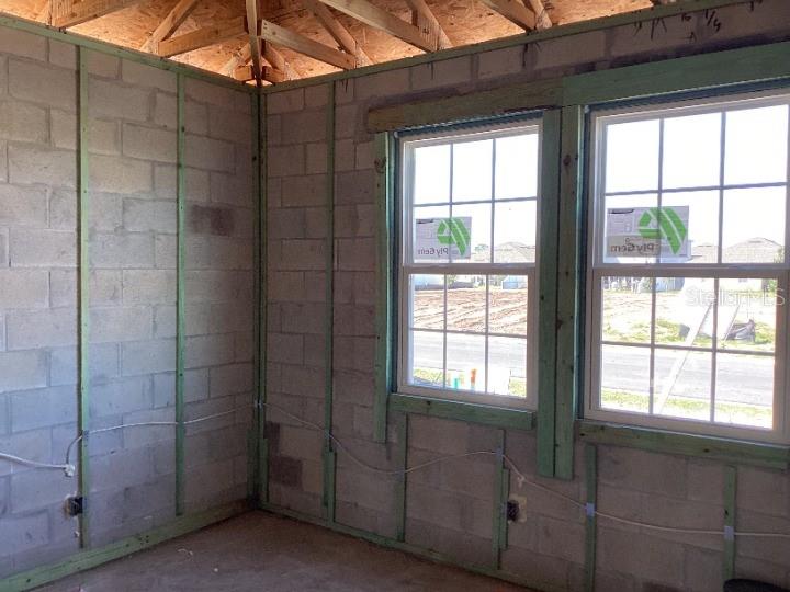 5762 Cattle Rnch Drive St. Cloud, FL 34771 - Photo 16 of 32 a bathroom with a window and a shower