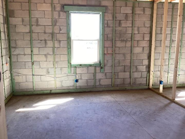 5762 Cattle Rnch Drive St. Cloud, FL 34771 - Photo 19 of 32 a view of an empty room with a window