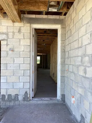 a view of a porch with wooden floor