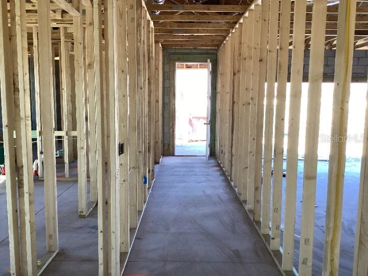5762 Cattle Rnch Drive St. Cloud, FL 34771 - Photo 9 of 32 a view of a porch with wooden floor