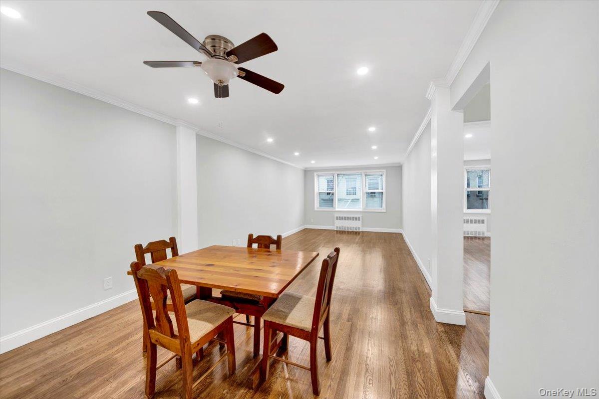 4265 Webster Avenue, Unit 5C Bronx, NY 10470 - Photo 10 of 21 a view of a dining room with furniture and wooden floor