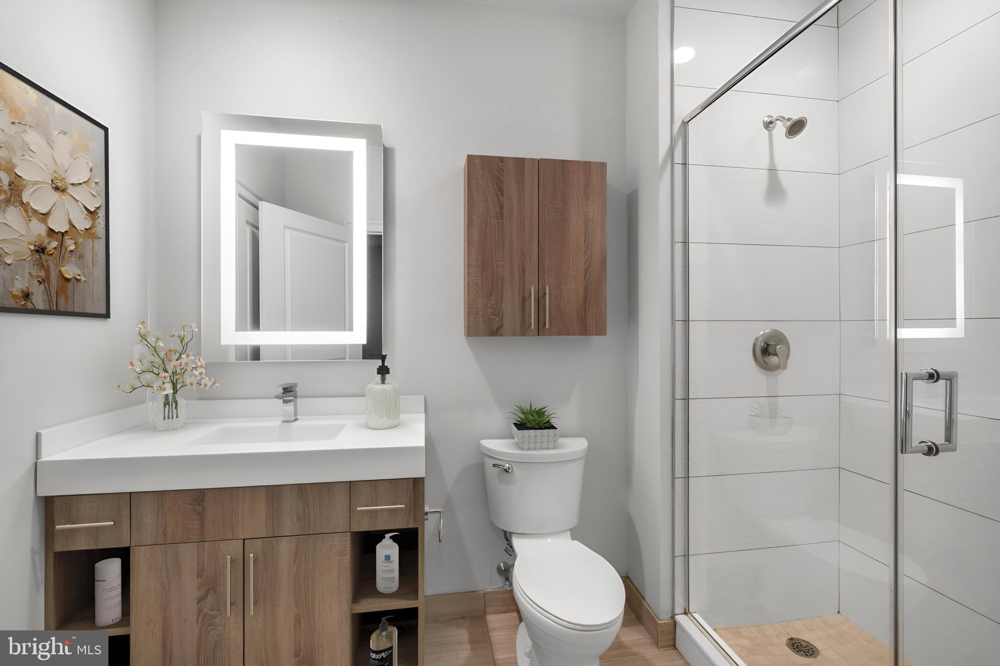 200 North 16th Street, Unit 1301 Philadelphia, PA 19102 - Photo 6 of 20 a bathroom with a sink toilet and shower