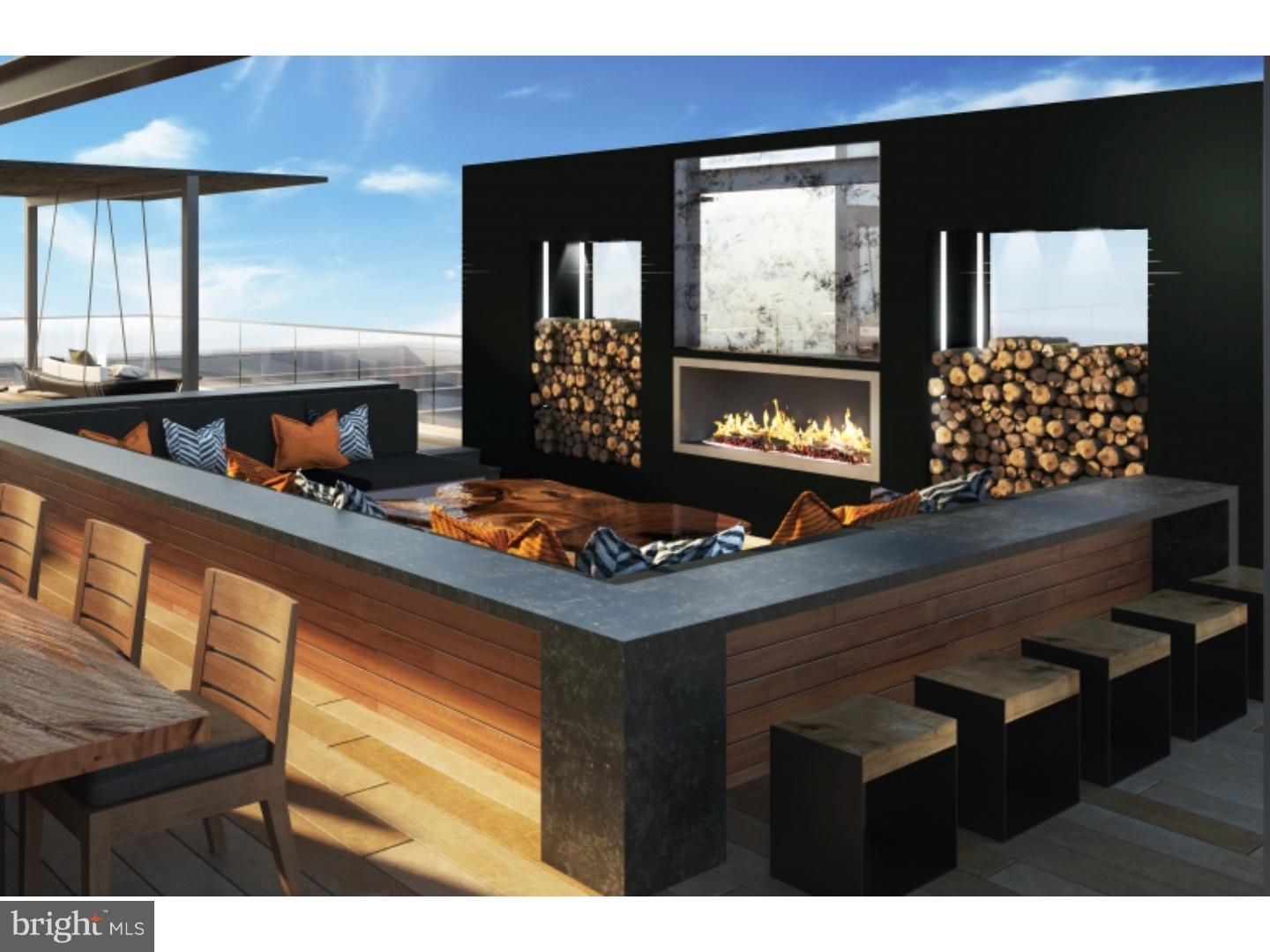 200 North 16th Street, Unit 1301 Philadelphia, PA 19102 - Photo 10 of 20 a living room with furniture and a floor to ceiling window