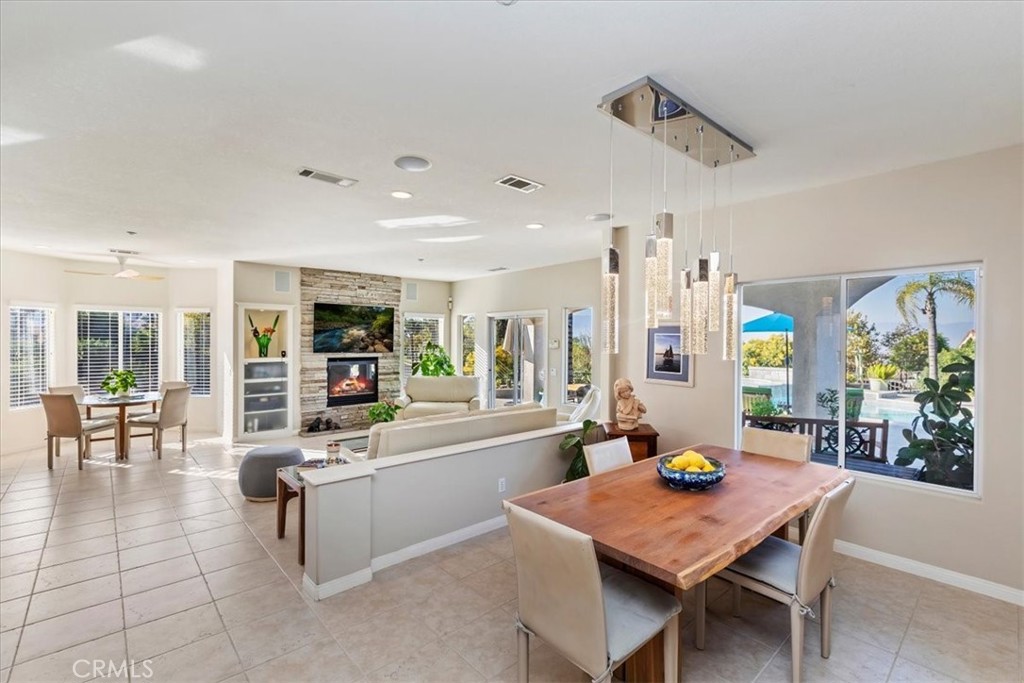 1260 Ransom Road Riverside, CA 92506 - Photo 12 of 50 a living room with furniture a dining table and chairs