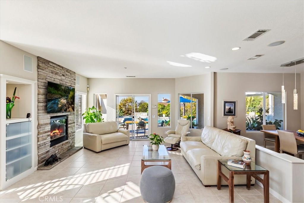 1260 Ransom Road Riverside, CA 92506 - Photo 13 of 50 a living room with furniture and a flat screen tv