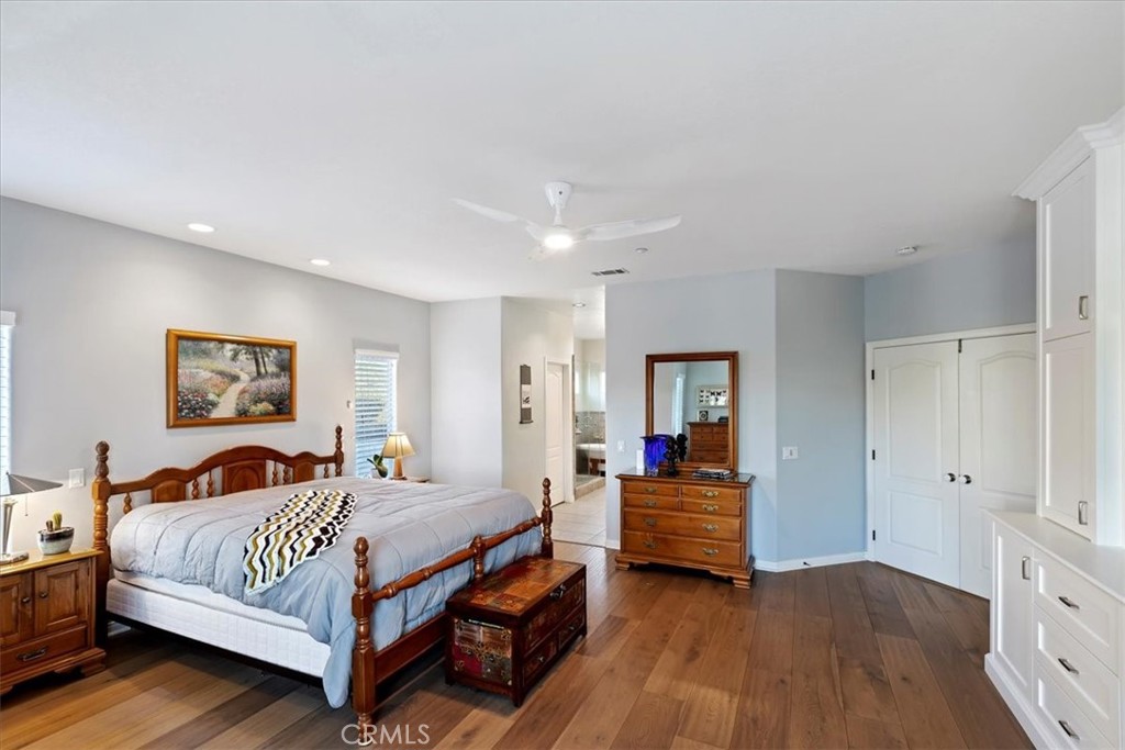 1260 Ransom Road Riverside, CA 92506 - Photo 21 of 50 a bedroom with a bed and a painting on the wall