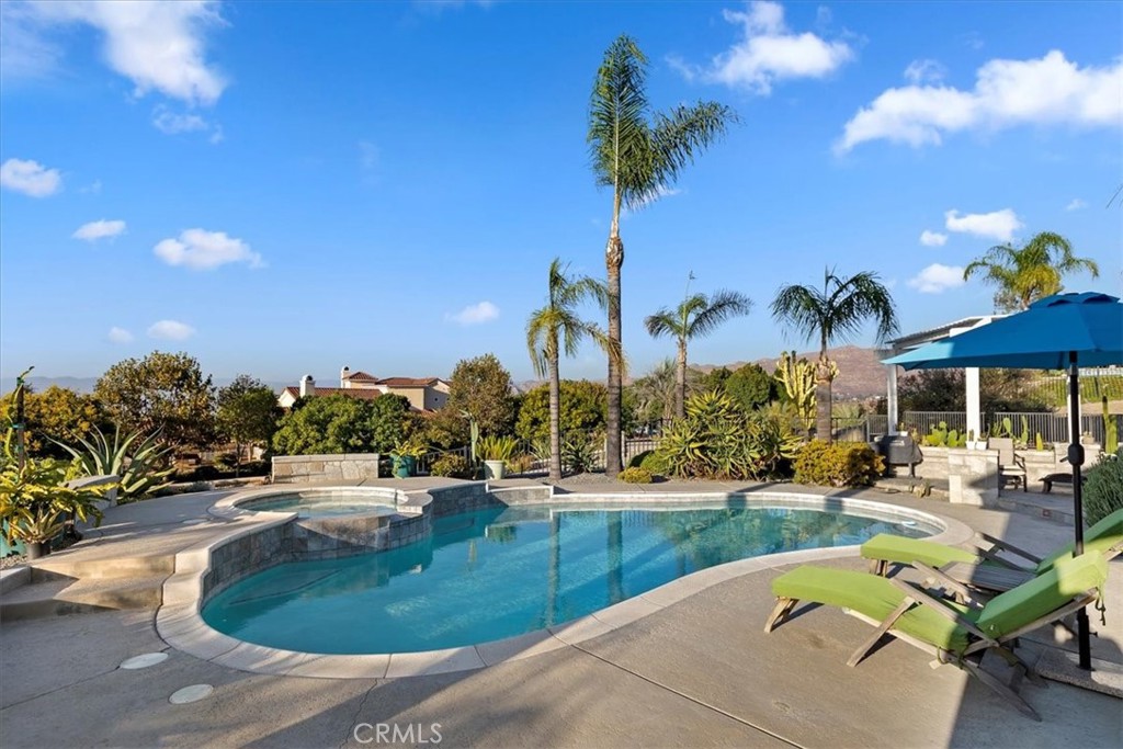 1260 Ransom Road Riverside, CA 92506 - Photo 32 of 50 a view of a swimming pool with a patio