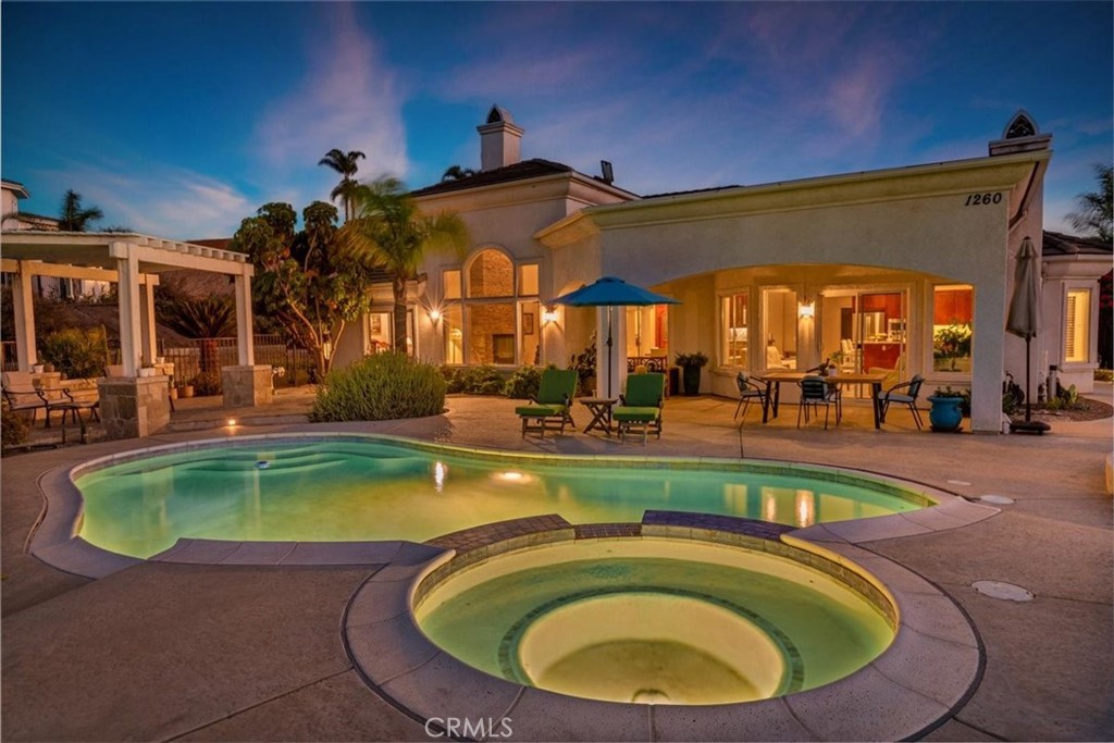 1260 Ransom Road Riverside, CA 92506 - Photo 42 of 50 a view of a swimming pool with outdoor seating