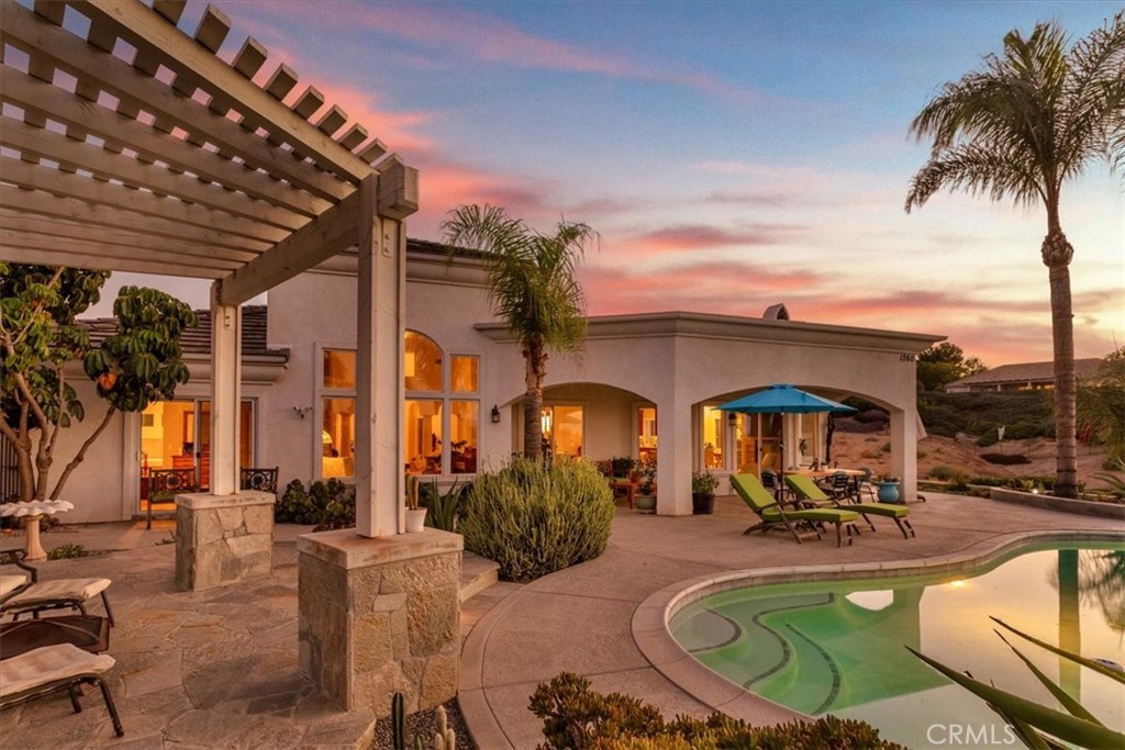 1260 Ransom Road Riverside, CA 92506 - Photo 44 of 50 a view of a swimming pool with outdoor seating