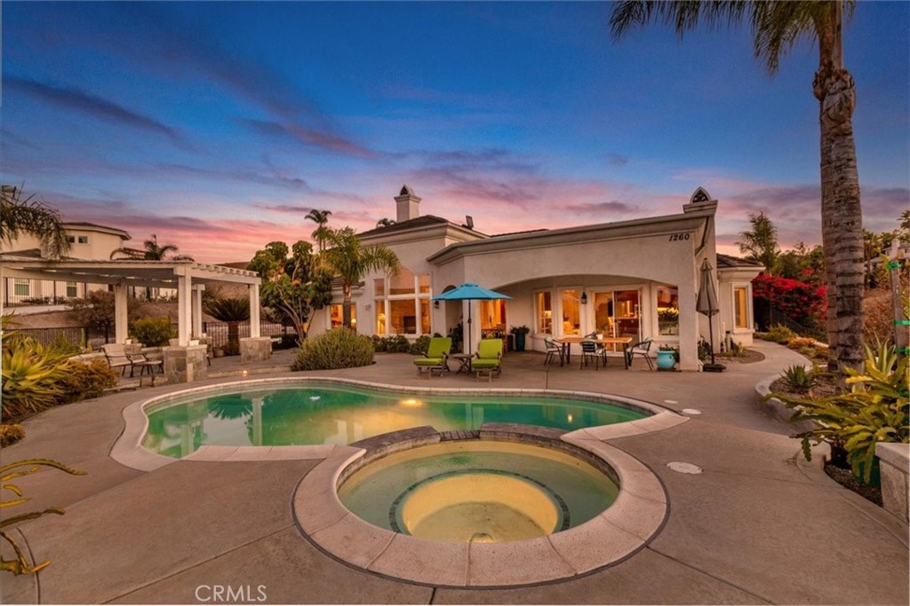 1260 Ransom Road Riverside, CA 92506 - Photo 45 of 50 a view of a house with swimming pool and sitting area