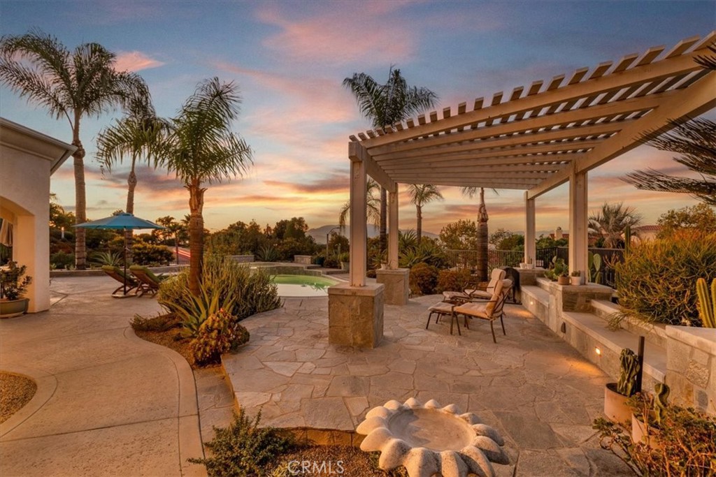 1260 Ransom Road Riverside, CA 92506 - Photo 46 of 50 a view of a patio with a table and chairs