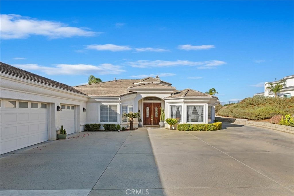1260 Ransom Road Riverside, CA 92506 - Photo 5 of 50 a front view of a house with a yard