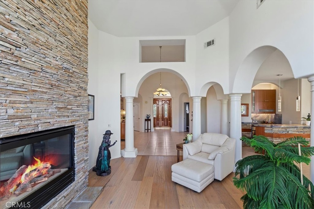 1260 Ransom Road Riverside, CA 92506 - Photo 8 of 50 a living room with furniture and a fireplace