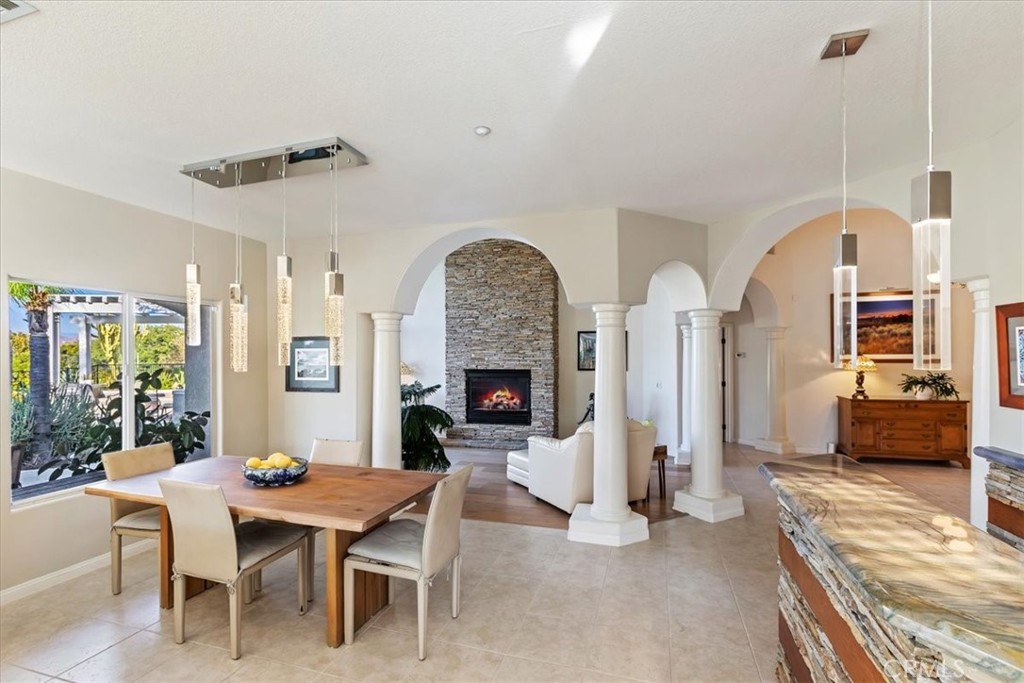 1260 Ransom Road Riverside, CA 92506 - Photo 9 of 50 a dining room with furniture window and wooden floor