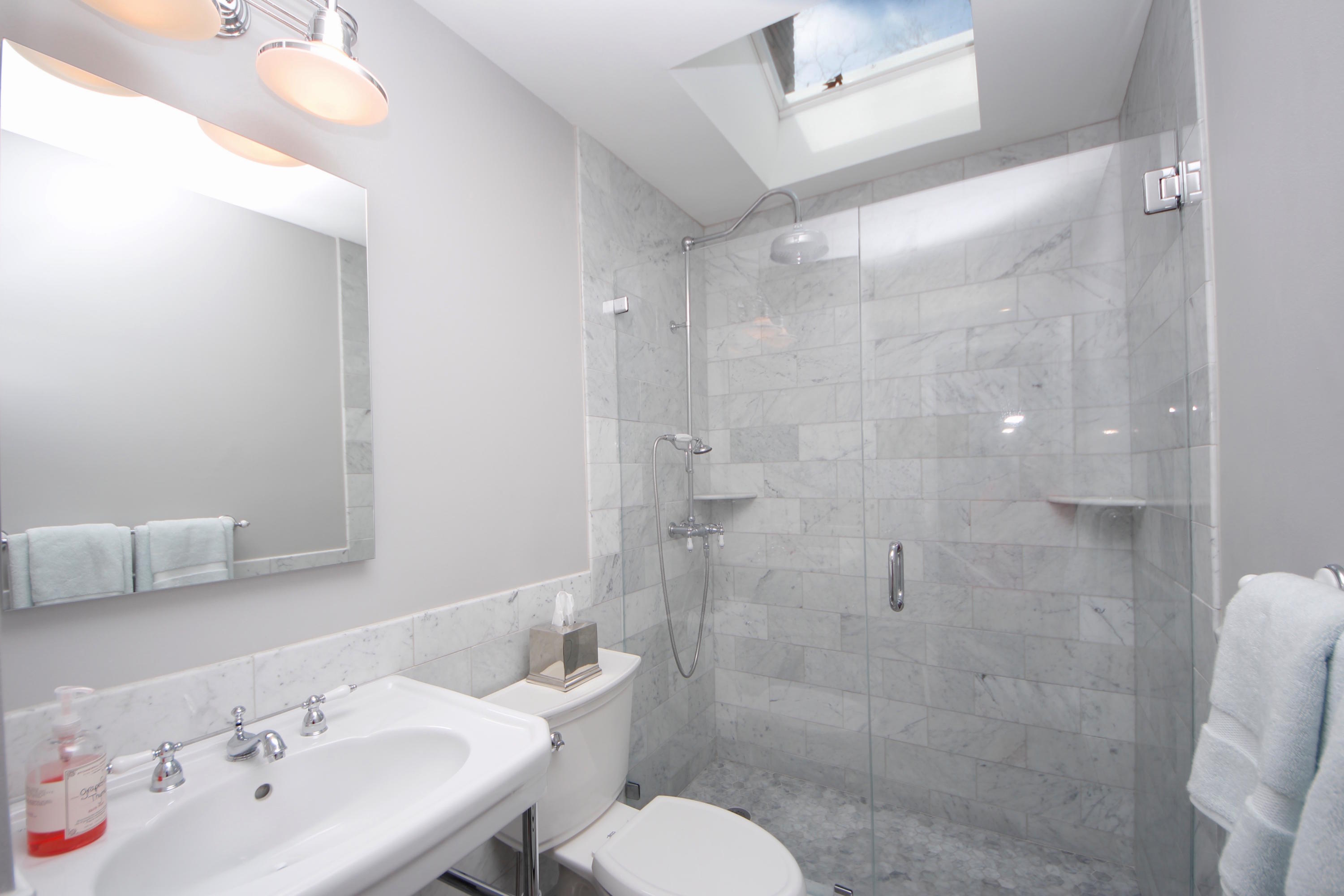 27 Thomes Street Rowayton, CT 06853 - Photo 11 of 19 a bathroom with a sink toilet and shower