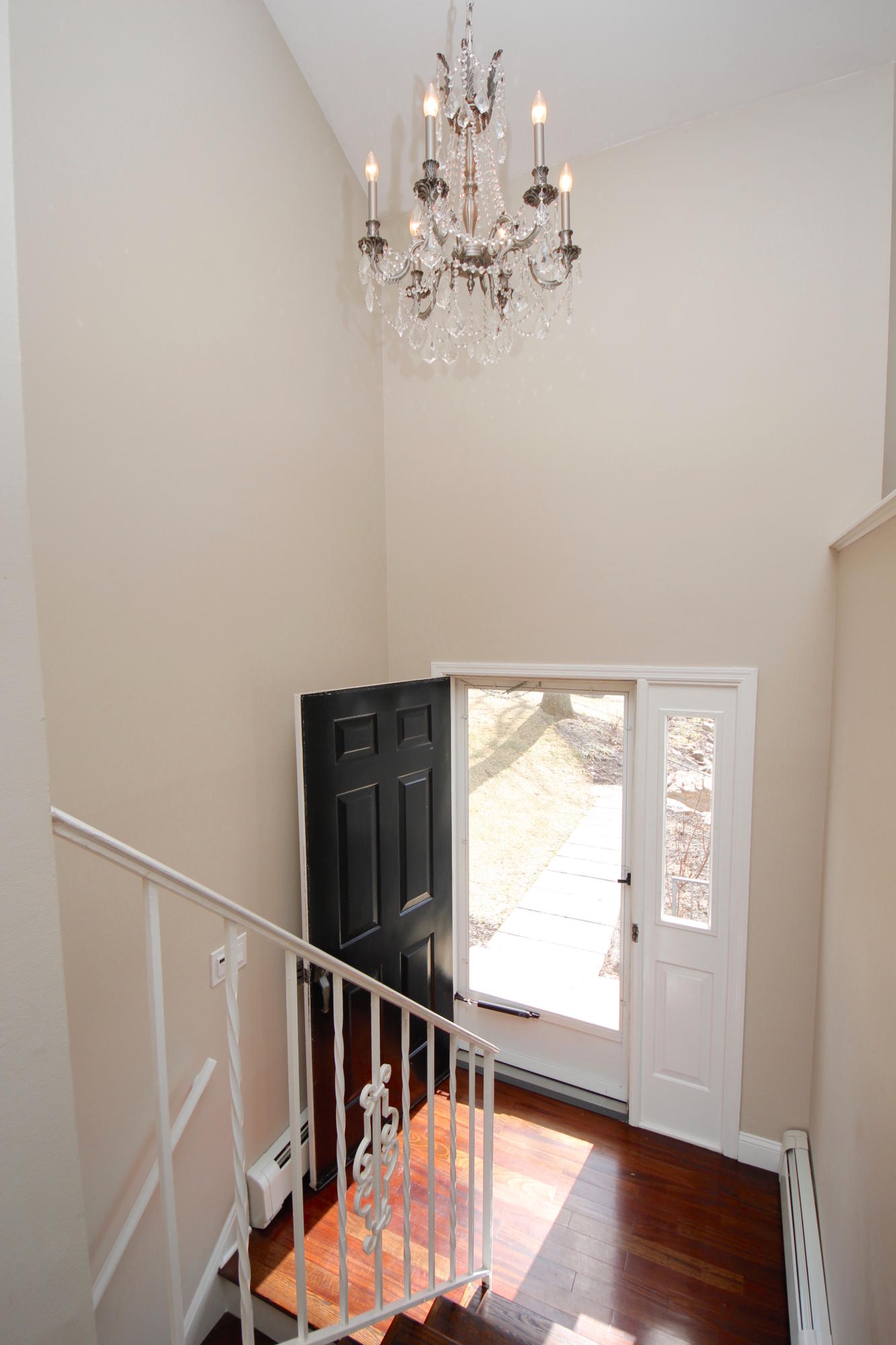 27 Thomes Street Rowayton, CT 06853 - Photo 16 of 19 a view of a room with wooden floor and windows