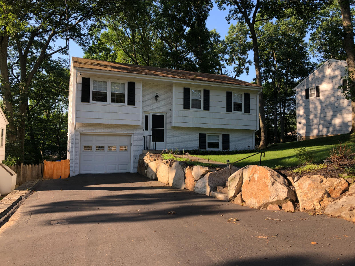 27 Thomes Street Rowayton, CT 06853 - Photo 2 of 19 a view of a house with pool