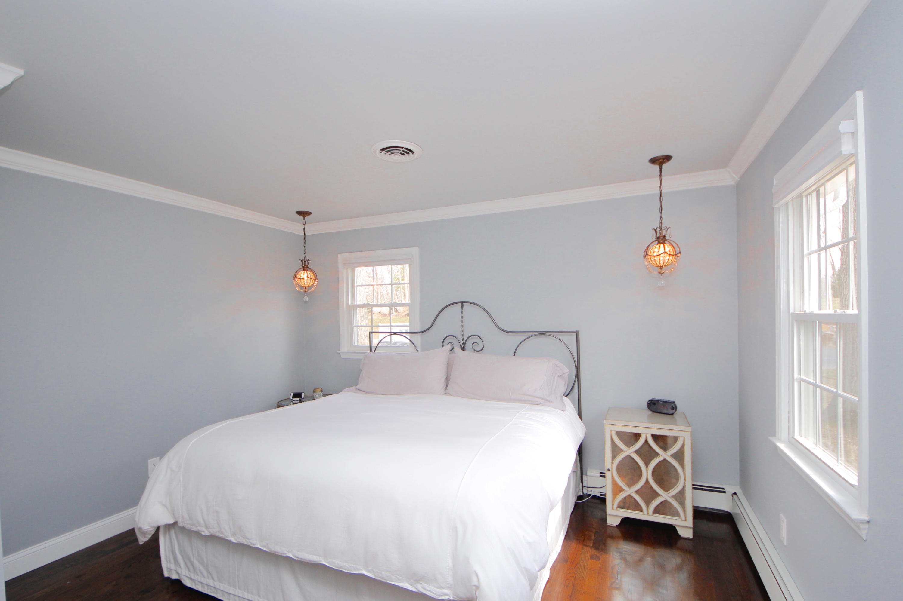 27 Thomes Street Rowayton, CT 06853 - Photo 10 of 19 a bedroom with a bed and a window