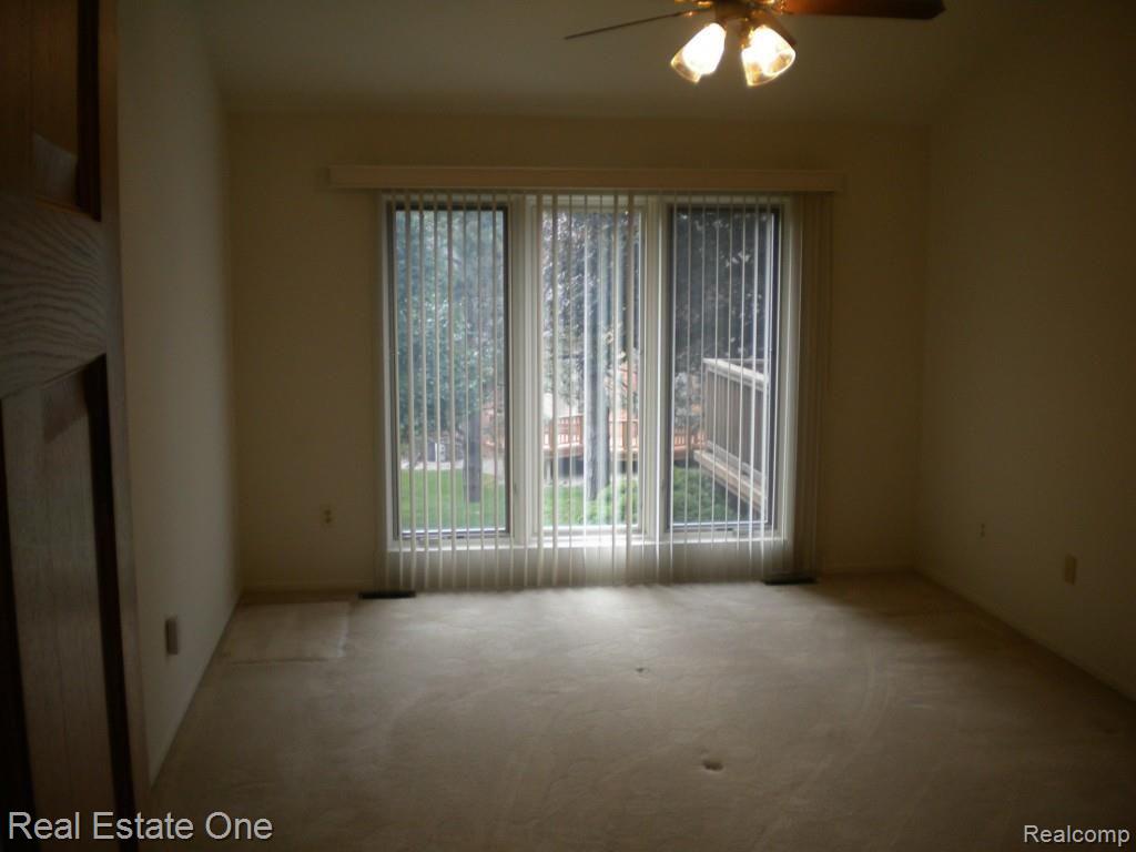 36615 Valley Ridge Drive Farmington, MI 48331 - Photo 29 of 51 Giant master bedroom has views of private back yard!