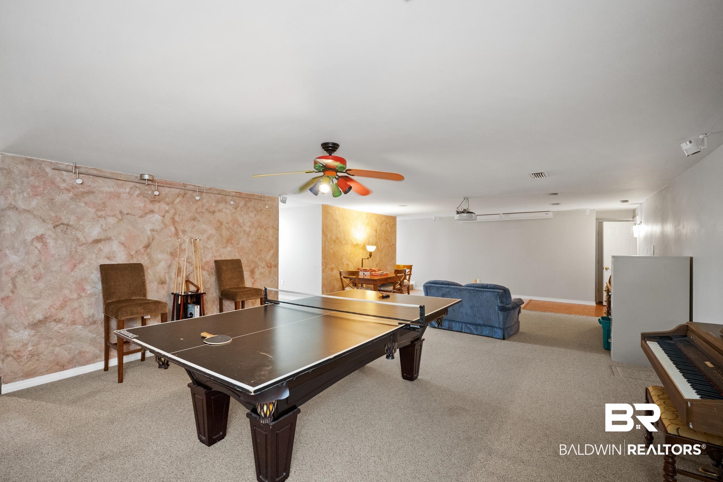 8585 Bay Harbor Road Elberta, AL 36530 - Photo 32 of 51 Game room with a ceiling fan and light colored carpet