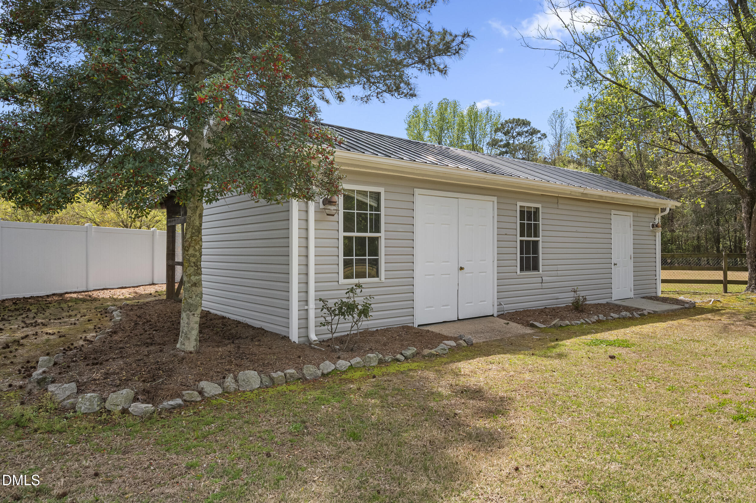 221 Pinkney Church Road Fremont, NC 27830 - Photo 35 of 36 a view of a house with a yard