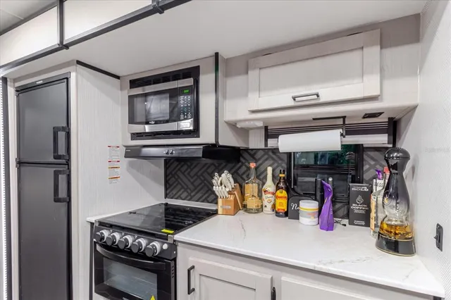 a bathroom with a bathtub and a sink