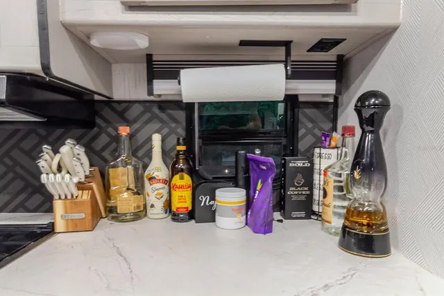 an aerial view of residential houses with outdoor space and street view