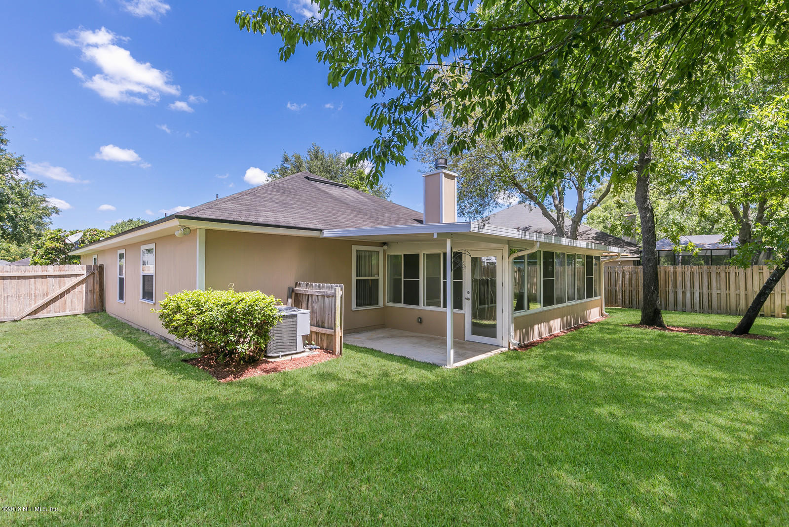 4316 Rye Court Jacksonville, FL 32259 - Photo 22 of 23 a view of a house with a yard and sitting area