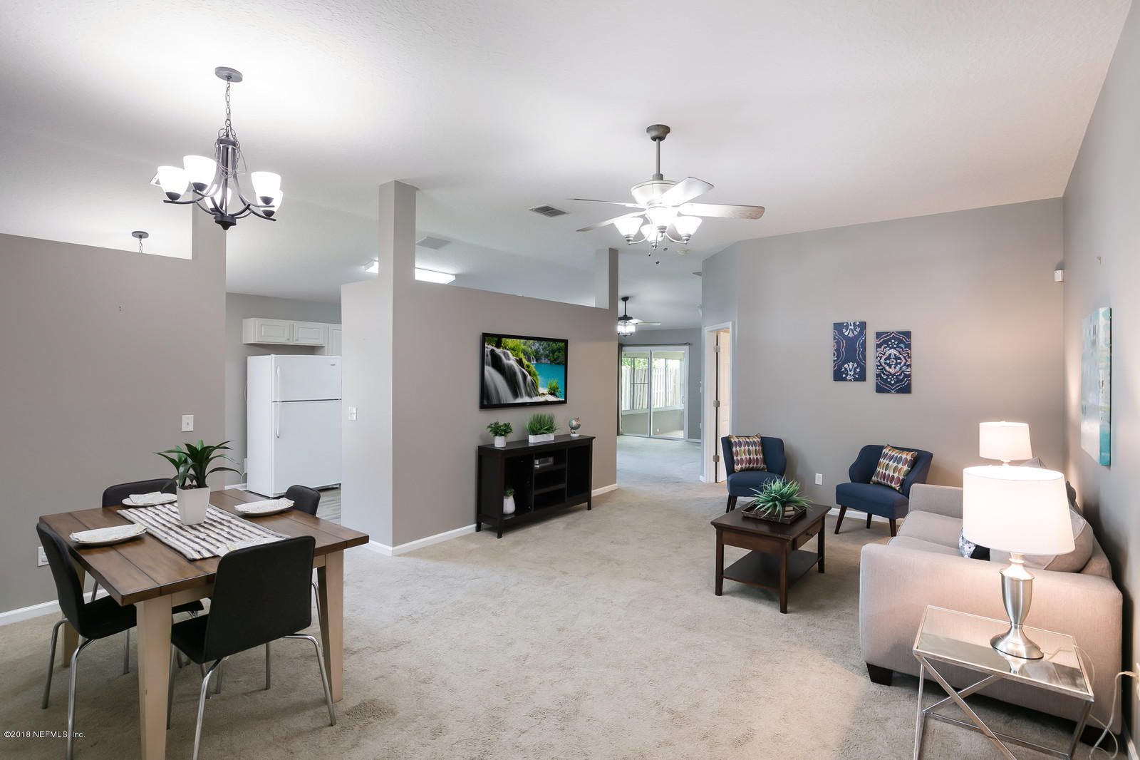 4316 Rye Court Jacksonville, FL 32259 - Photo 3 of 23 a view of a dining room with furniture and chandelier