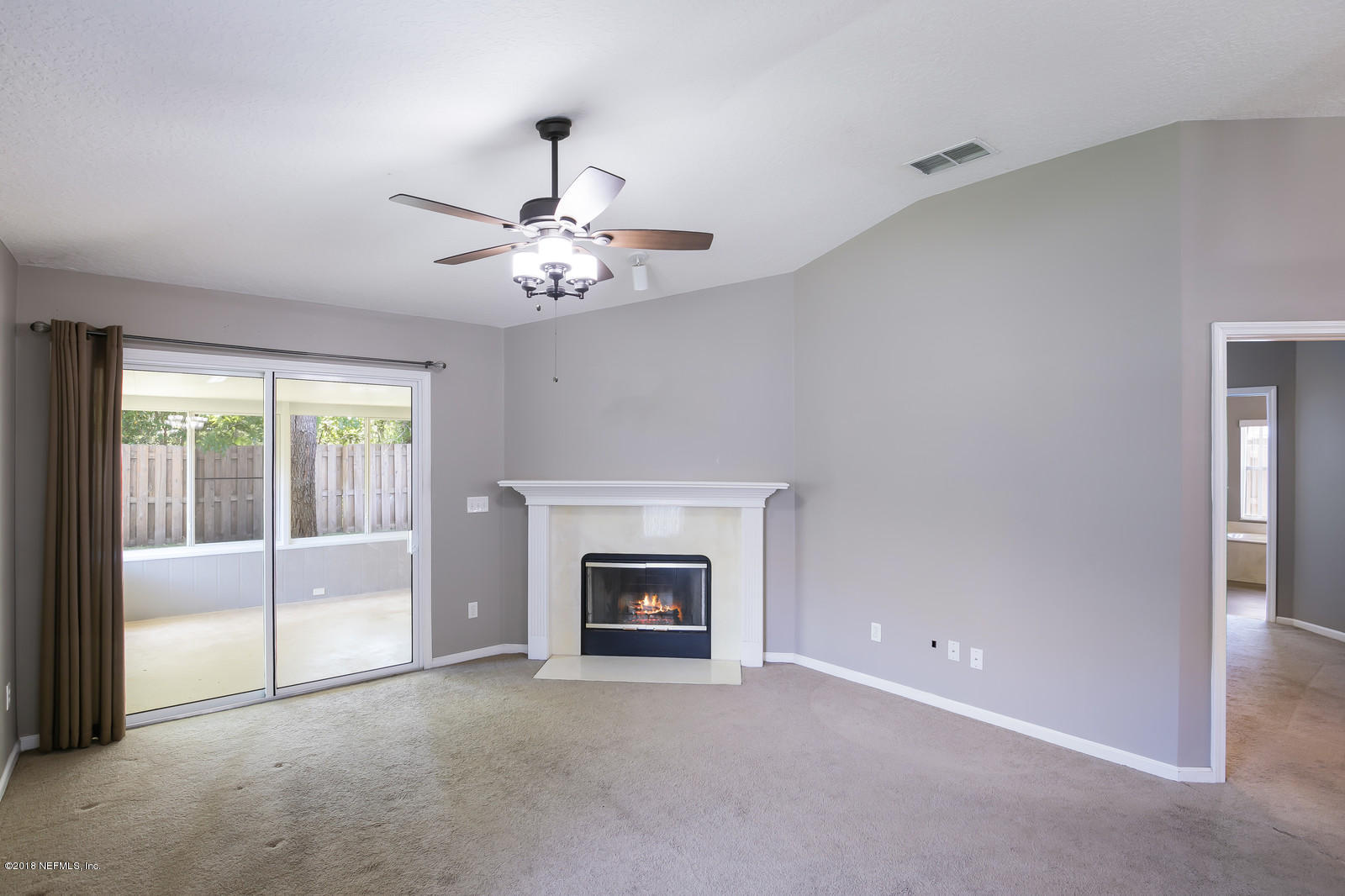 4316 Rye Court Jacksonville, FL 32259 - Photo 4 of 23 a view of an empty room with a fireplace