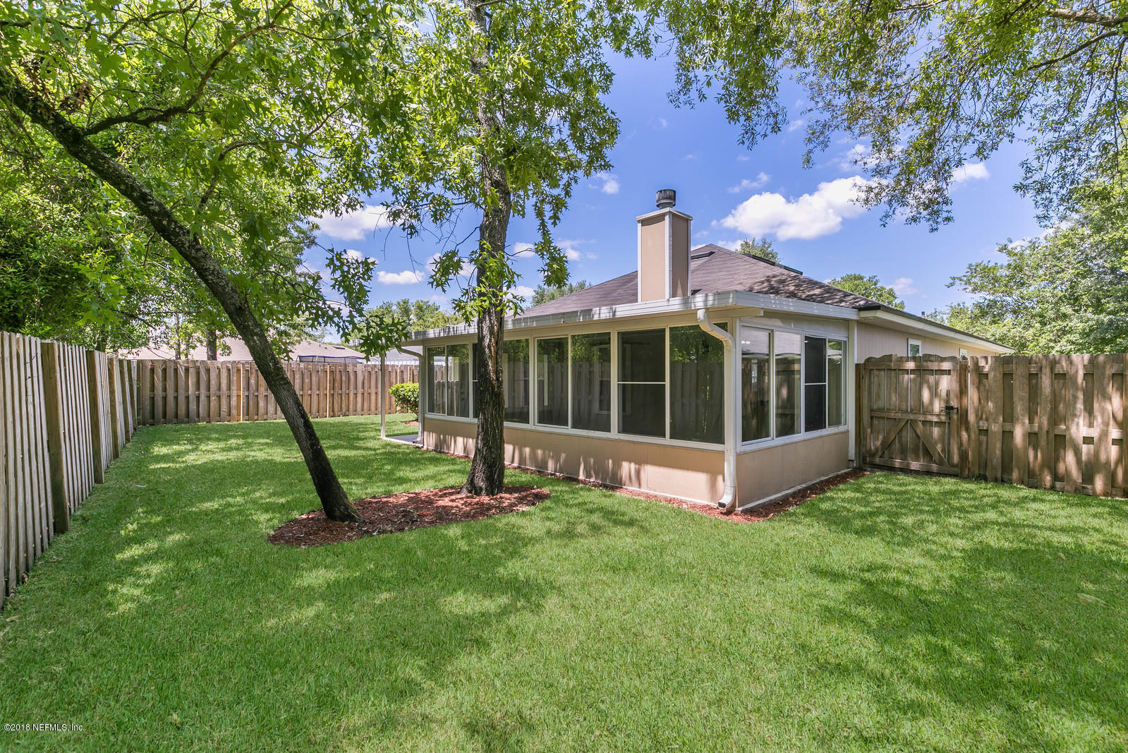 4316 Rye Court Jacksonville, FL 32259 - Photo 8 of 23 a view of a house with backyard and a tree