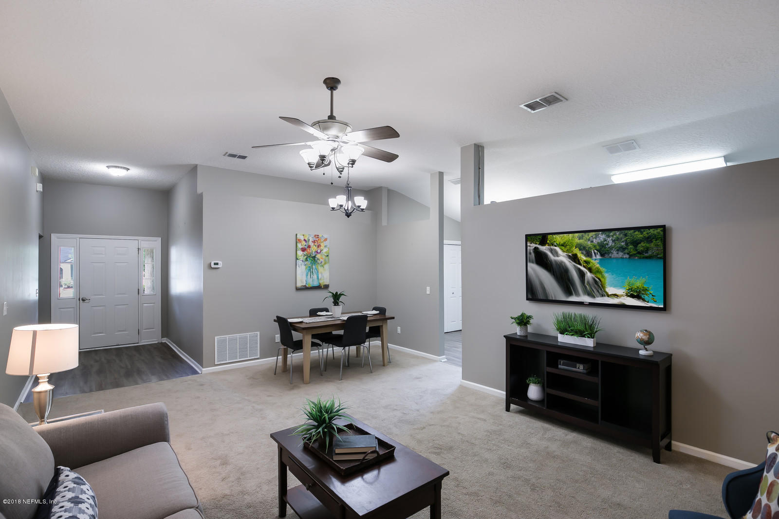 4316 Rye Court Jacksonville, FL 32259 - Photo 9 of 23 a living room with furniture and a flat screen tv