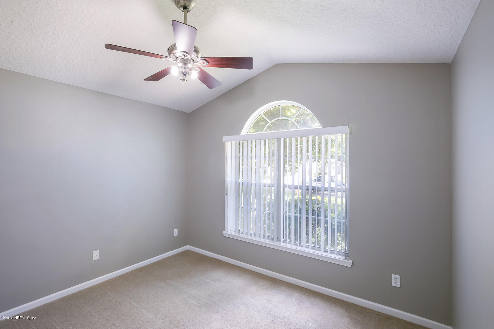 4316 Rye Court Jacksonville, FL 32259 - Photo 10 of 23 an empty room with windows and ceiling fan