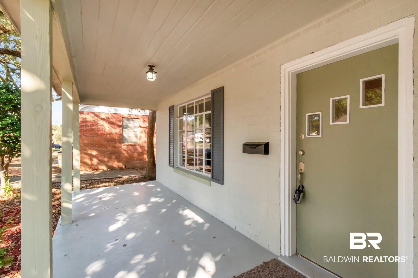 292 Siena Vista Street Mobile, AL 36607 - Photo 25 of 30 View of patio / terrace featuring covered porch