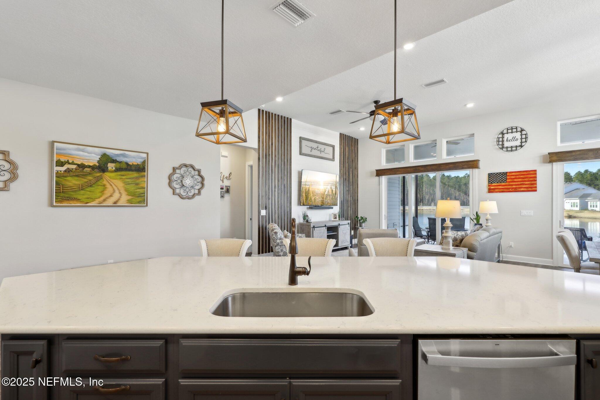 406 Navigators Road St. Johns, FL 32259 - Photo 26 of 57 a bathroom with a sink and a mirror