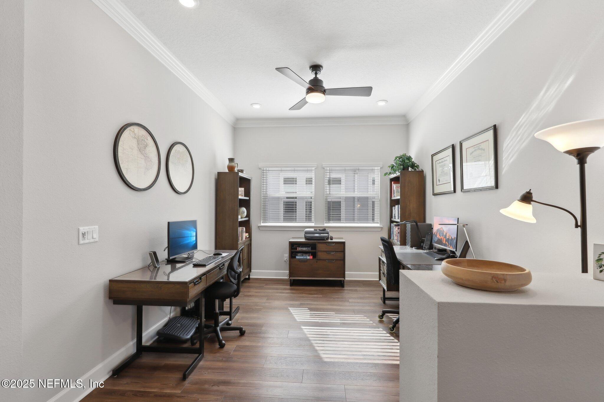 406 Navigators Road St. Johns, FL 32259 - Photo 35 of 57 a living room with furniture and a chandelier